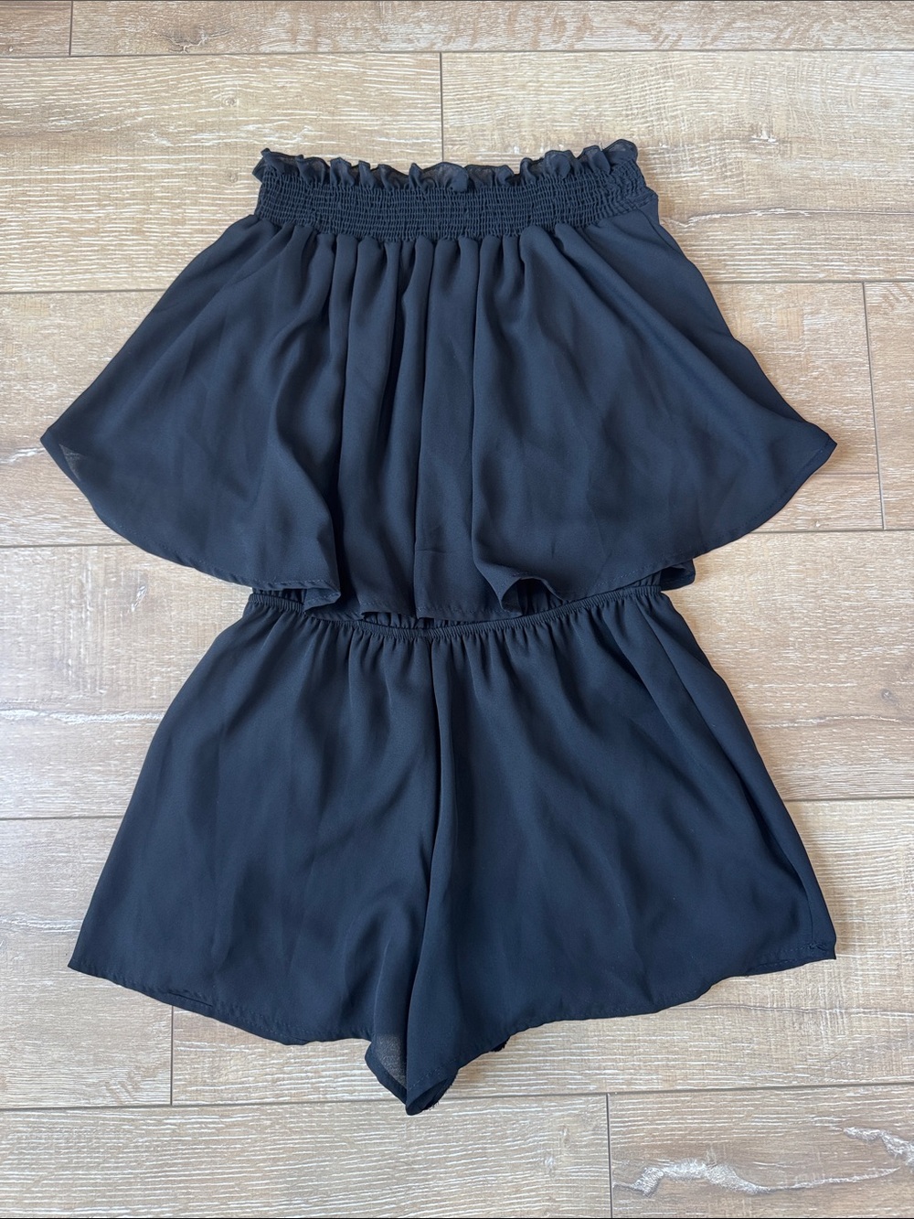 Black Smocked Waist Ruffle Romper Shorts